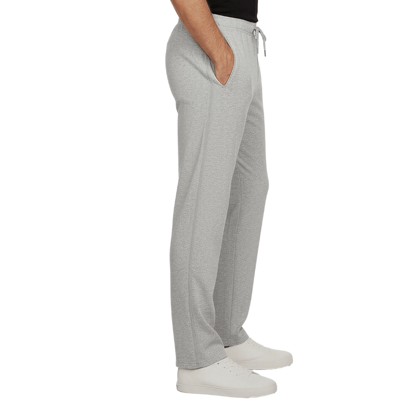 Graue Jogginghose mit geschlossenen Seitenreißverschlüssen und Eingrifftaschen, seitlich an einer Person